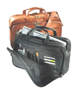 cowhide, rawhide, leather, full-grain, half-grain, wine, carrier, carry, double holder, single holder, leather case, leather bag, leather tote, leather binder, briefcase, desk accessories, jotters, journals, picture holders, portfolios, toiletry bags, wine carriers, vinyl, factory direct