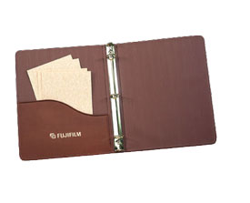 tan stitched 3-ring binder